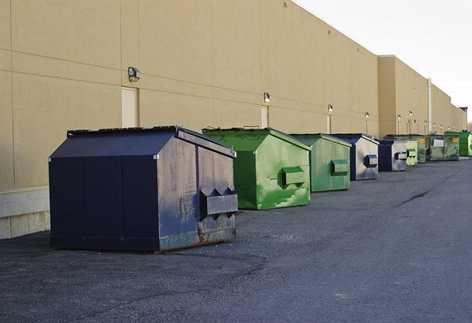 a large metal bin for waste disposal on the construction site in American Falls